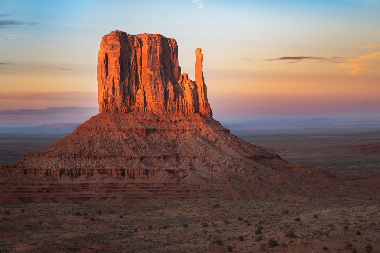 photo of red rock with golden light