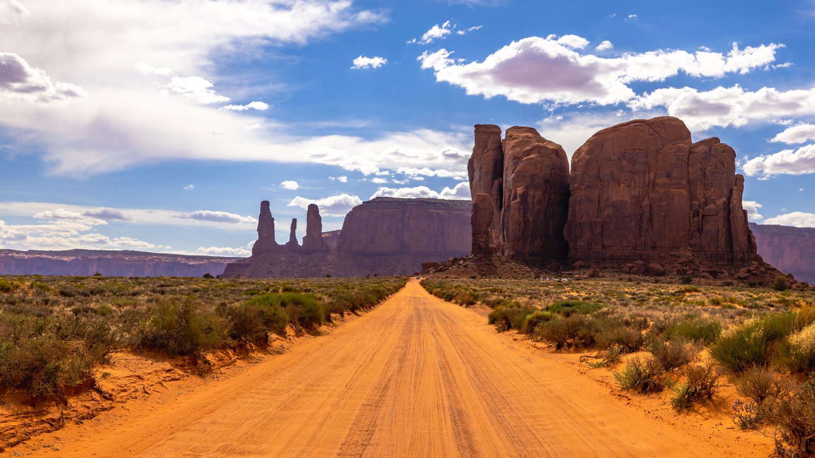 dirt road with red rocks