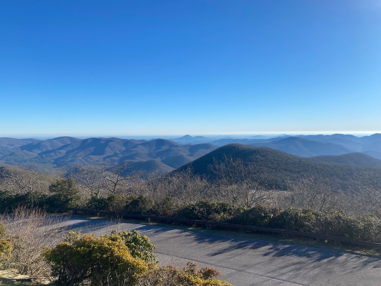 photo of mountains under clear blue sky