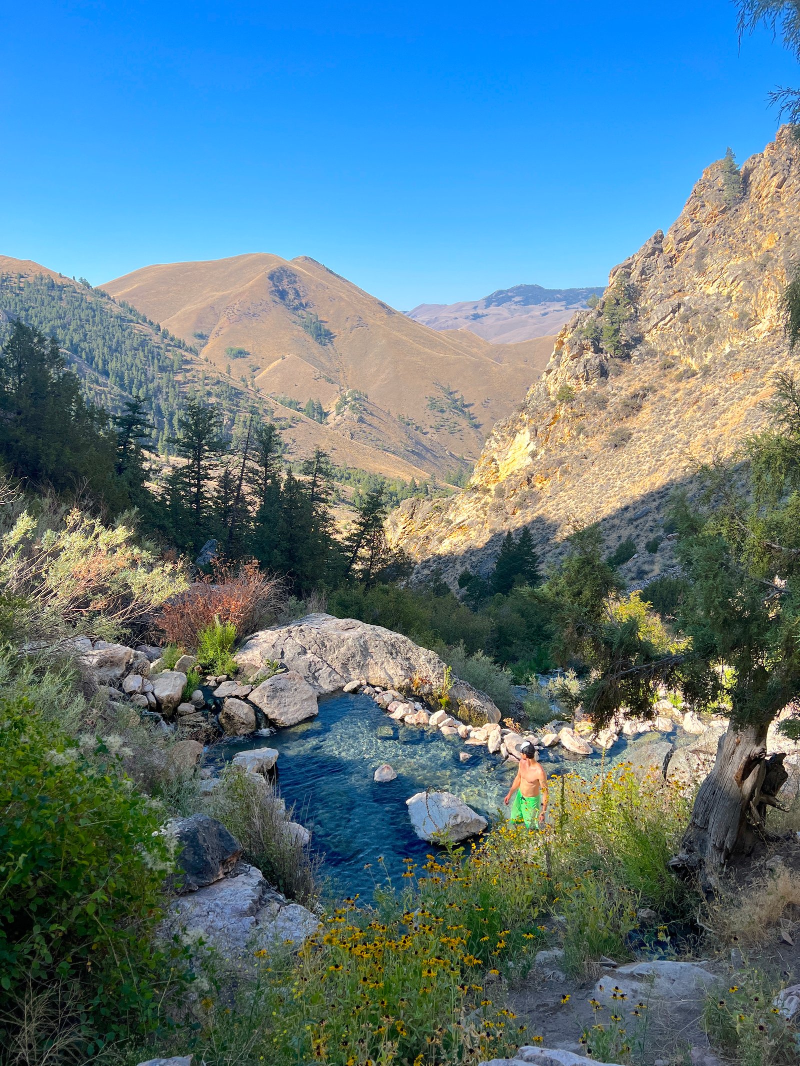 Goldbug Hot Springs surrounded by mountains in Salmon, Idaho