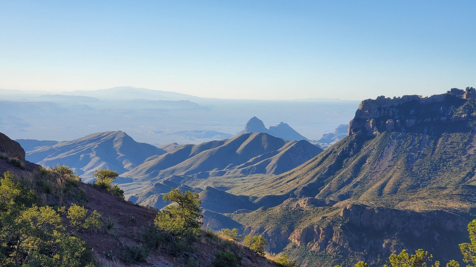 Sweeping mountain and desert panorama from the Lost Mine Trail overlook in Big Bend National Park.