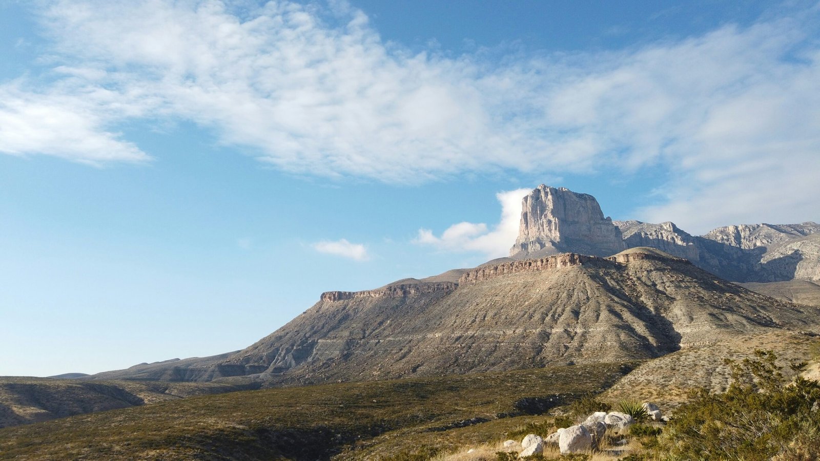 Sweeping mountain landscape view of the desert peaks in Guadalupe Mountains National Park, Texas.