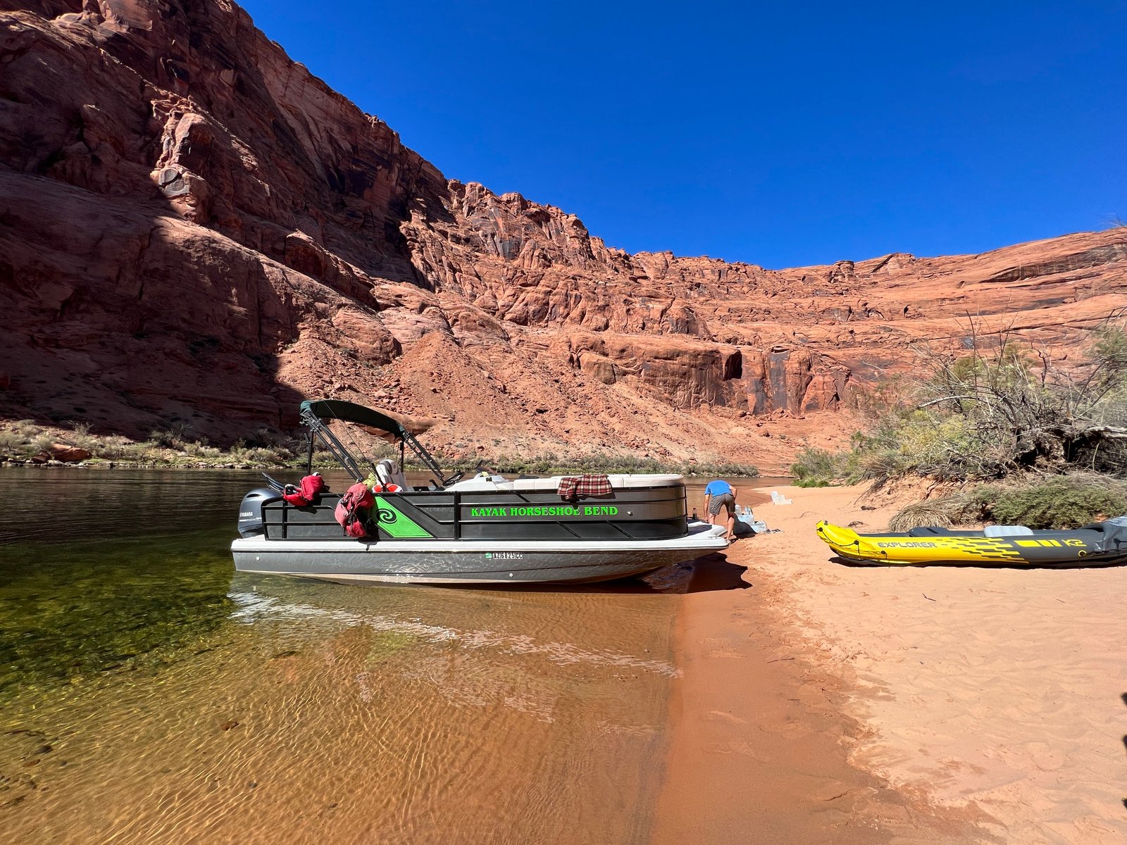 boat on shoreline in canyon