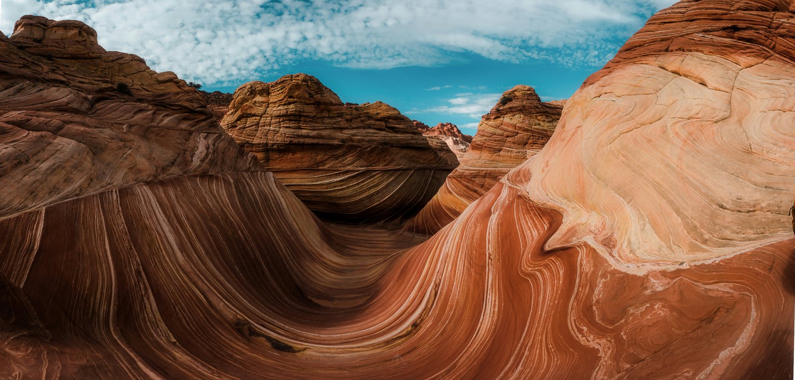 photo of colorful sandstone waves
