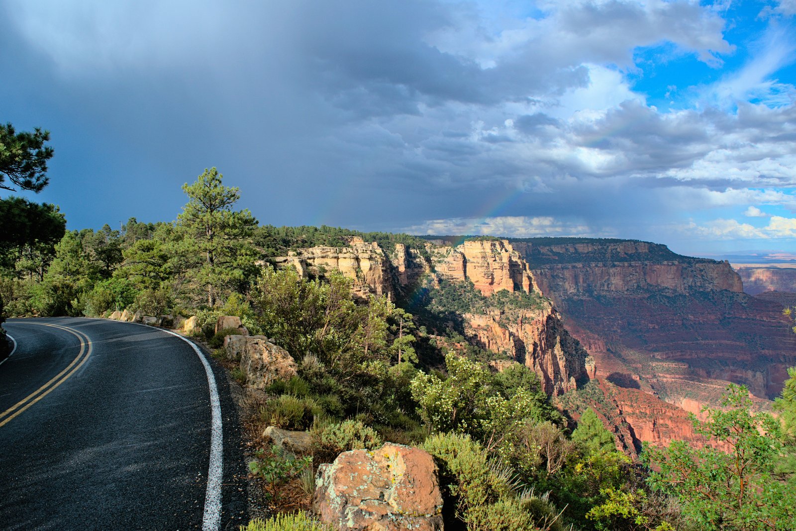photo of road and canyon off to the side