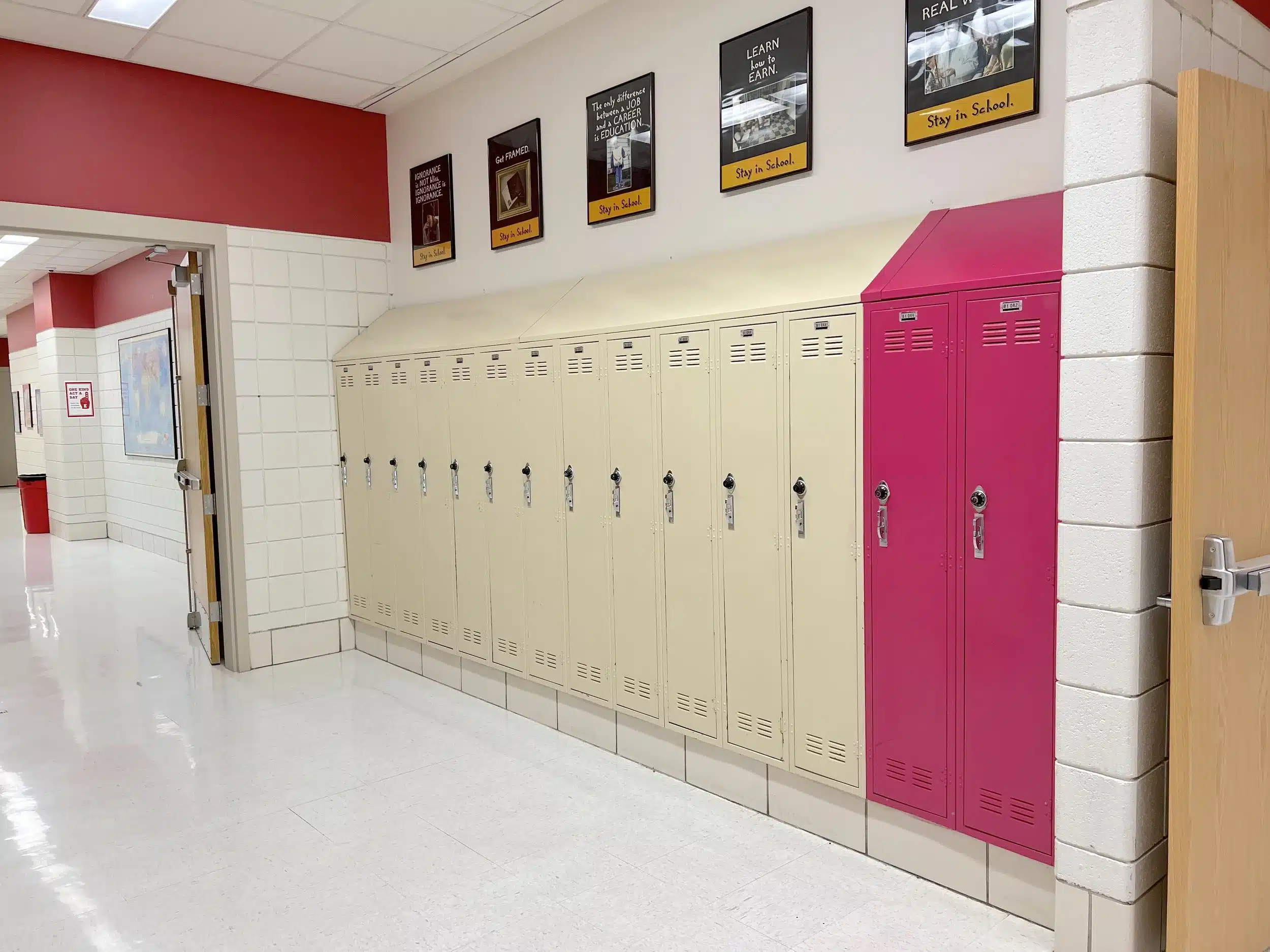 The designated filming location of Sharpay’s locker situated next to other student lockers in the hallway at East High School in Salt Lake City.